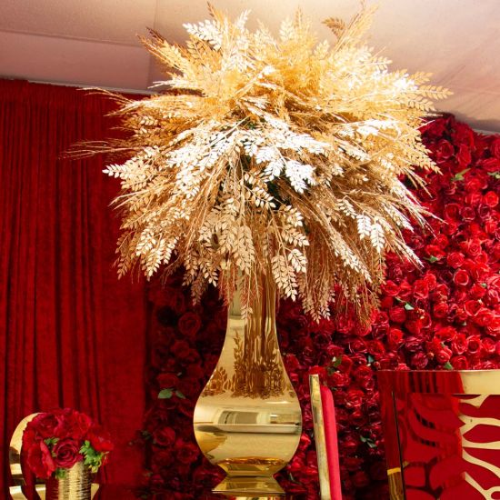 Gold reflection floral urn with faceted mirrored finish, modern statement vase for wedding centerpieces and luxury event décor.